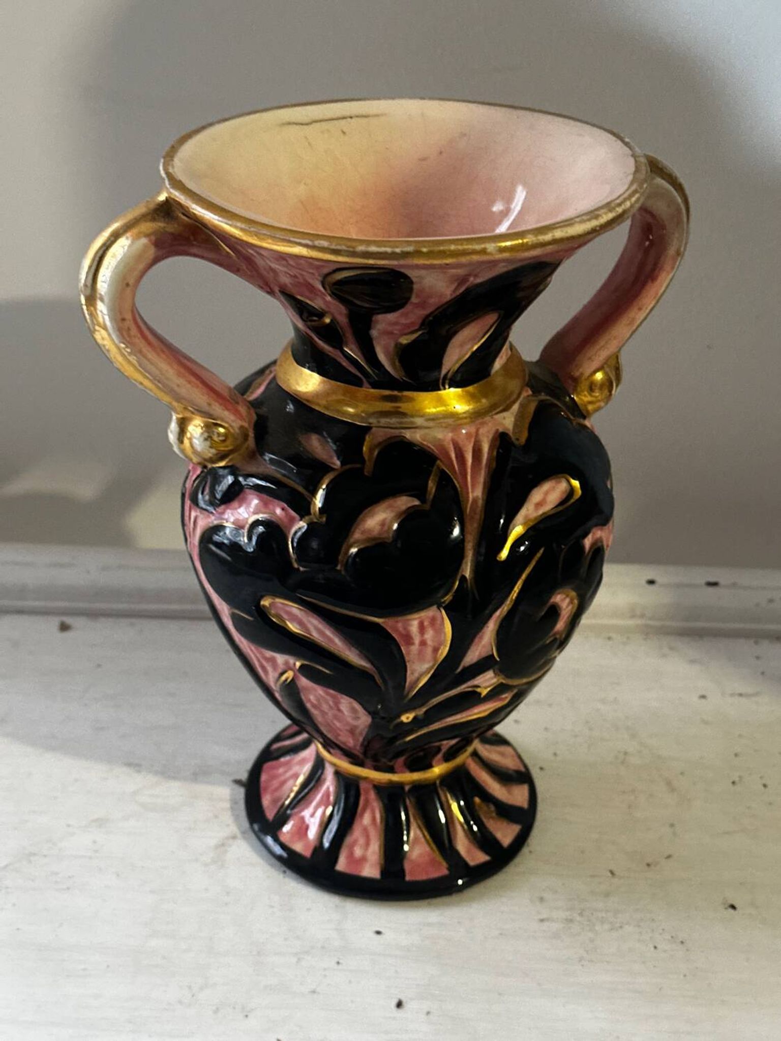 Vintage Vallauris vase amphora with relief floral decoration.
