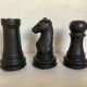 Trio of chess game candlesticks, rook, knight, pawn