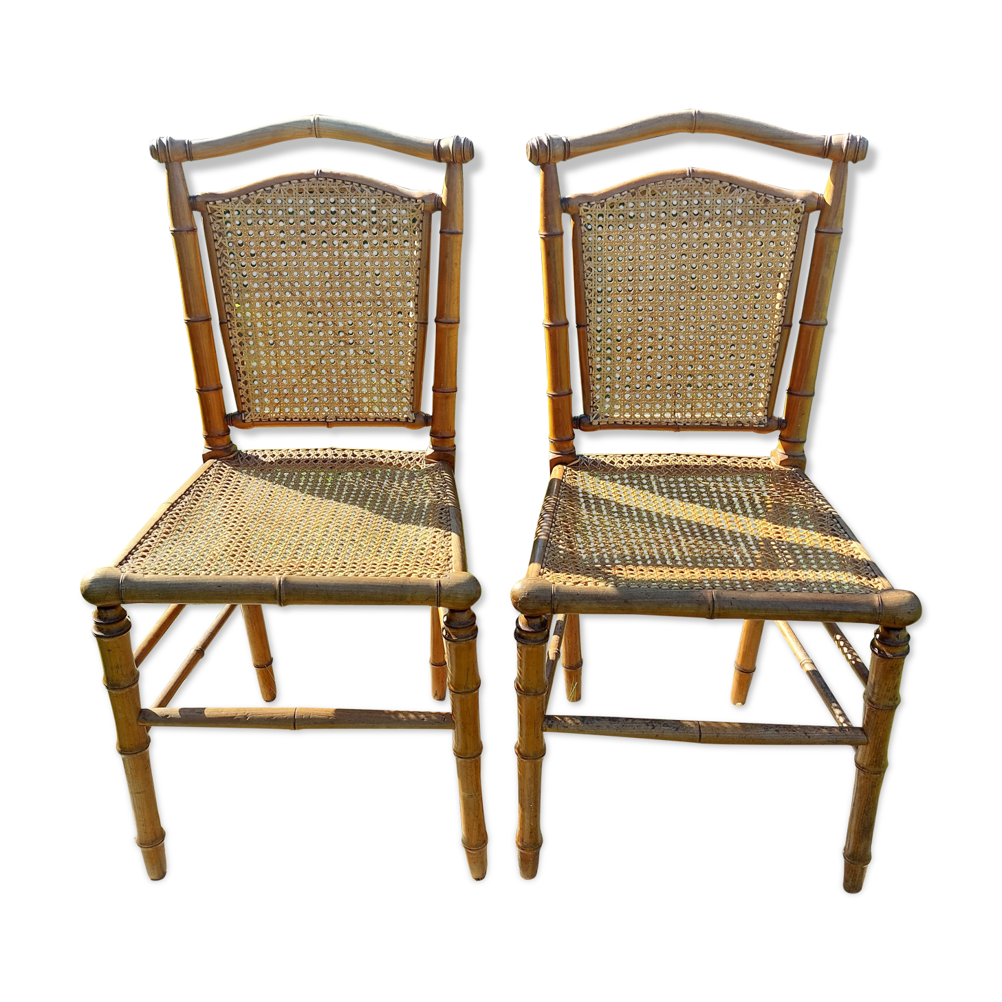 Duo of wooden chairs turned bamboo style