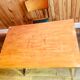 Wooden 50s portfolio table