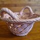 Vintage woven ceramic pocket basket