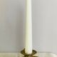 20th century chiseled brass socket candle holder representing Horsemen in armor