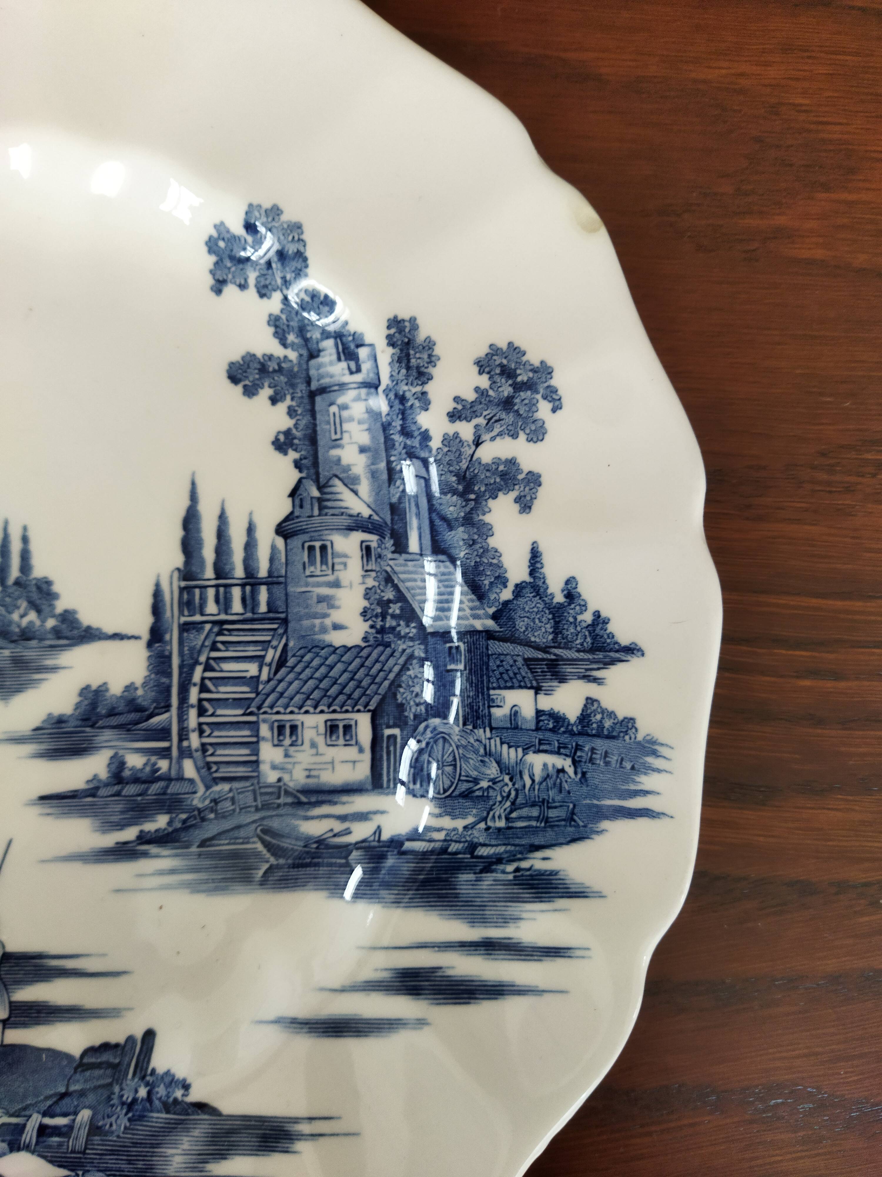 8 blue & white plates