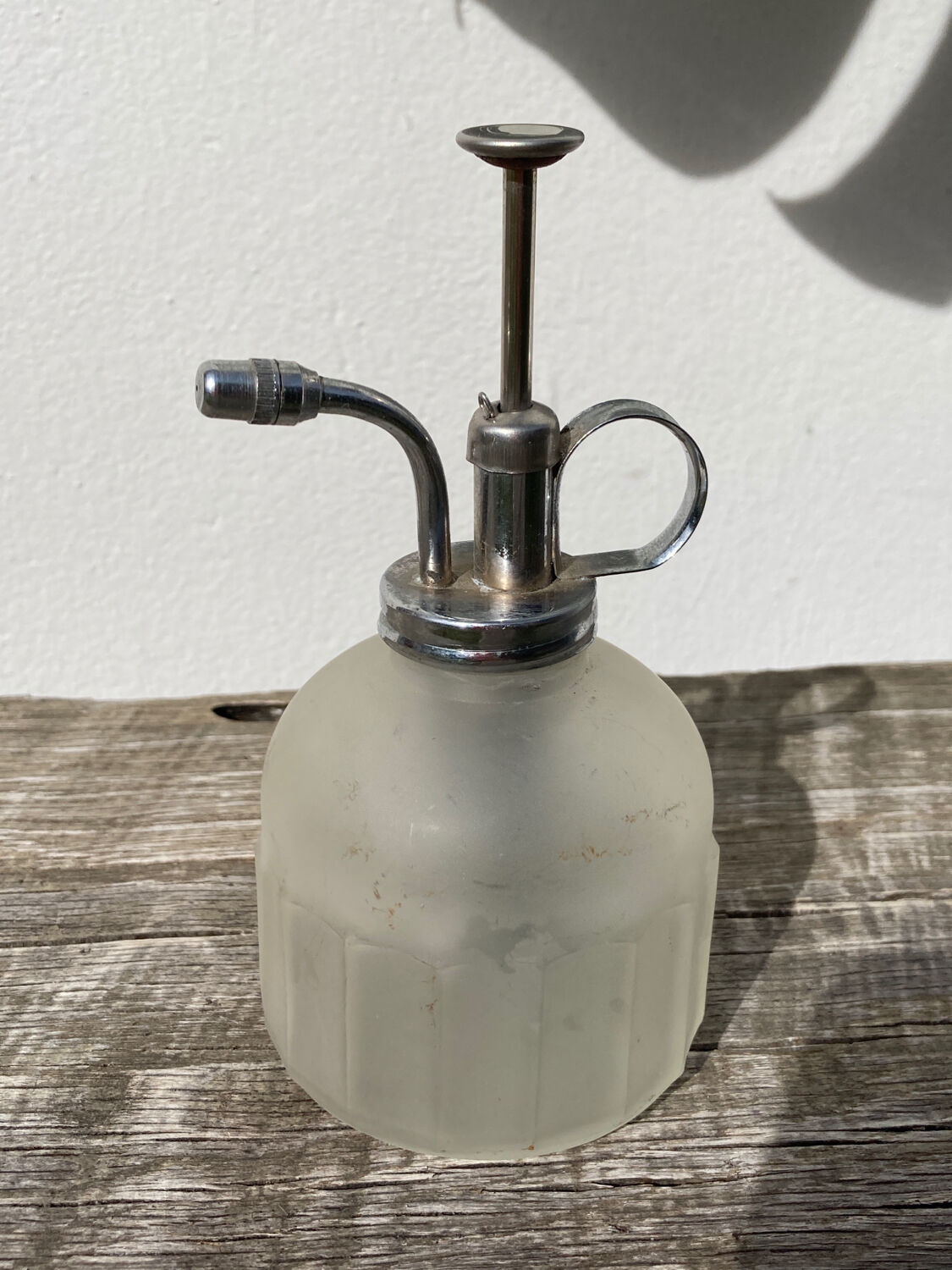 Plant sprayer opaque glass and metal