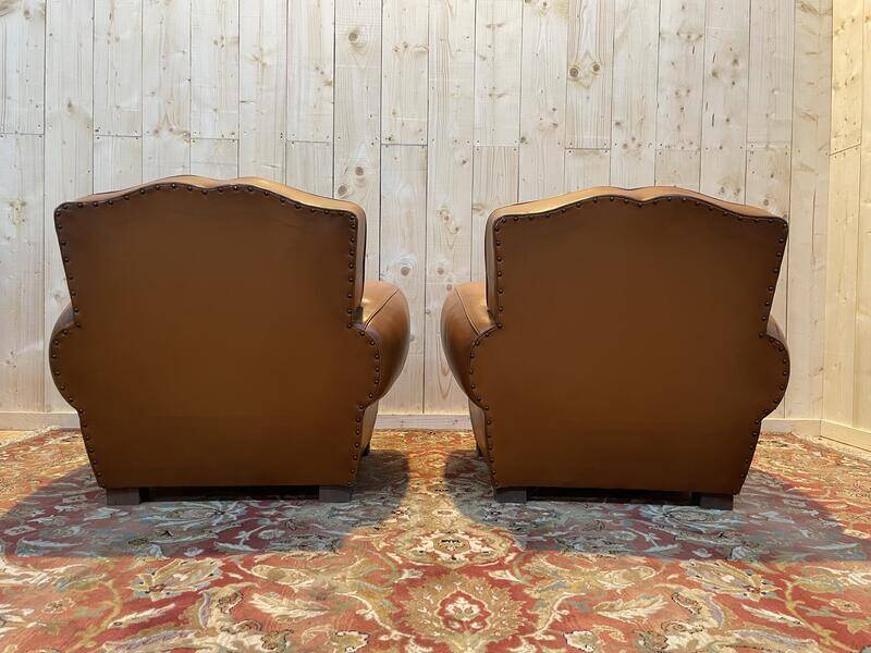 Pair of art deco leather club armchairs