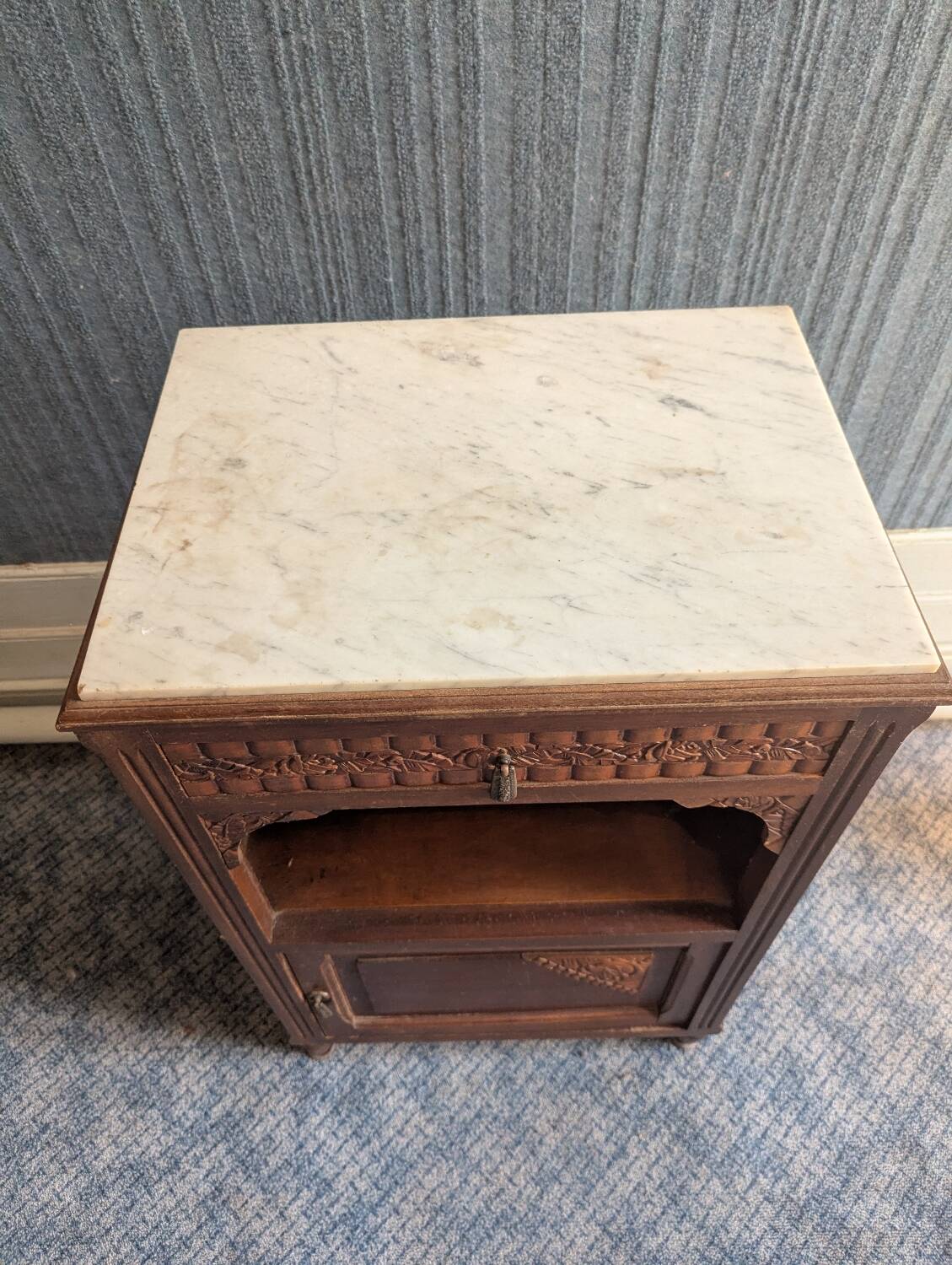 Bedside table with a marble top