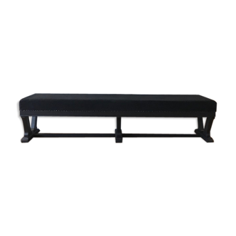 Bench covered in black fabric