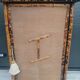 burnt bamboo wardrobe and grass cloth