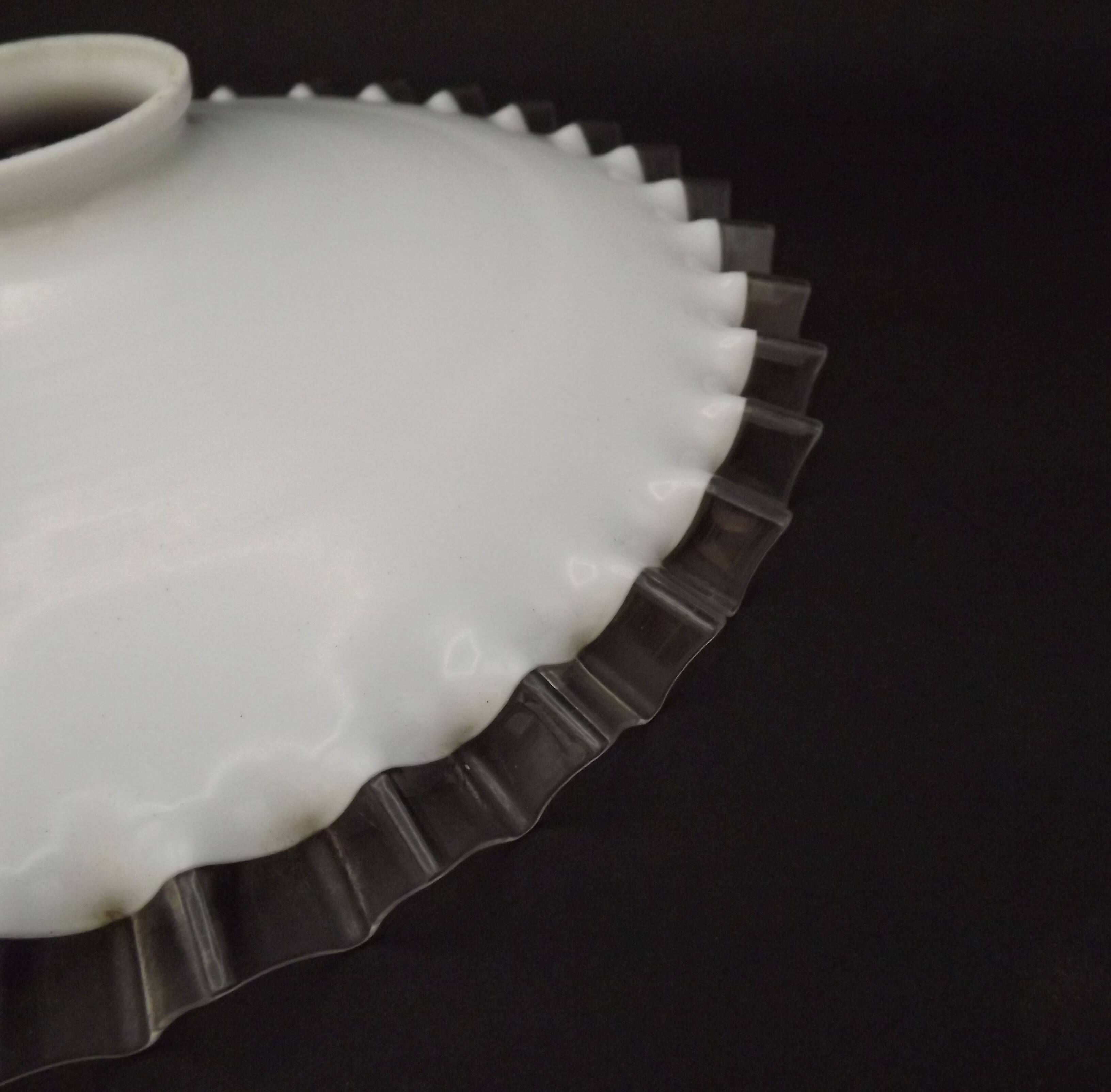 Fringed opal white glass pendant lampshade with scalloped edge.