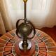 Wrought iron lamp with armillary sphere decorations