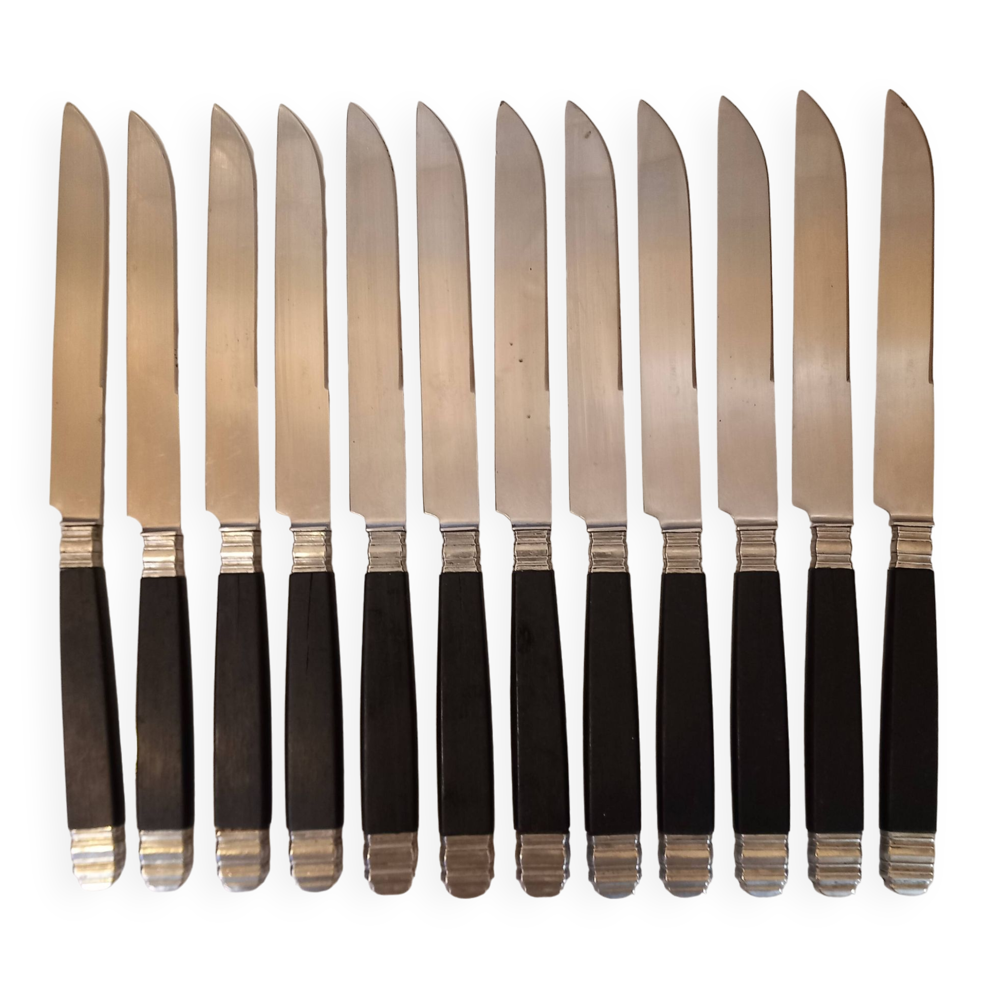 12 black Empire style table knives with silver ferrule Gimel