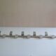 Vintage 70s brushed aluminum metal 12-hook wall coat rack