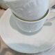 Set of 9 white porcelain coffee cups