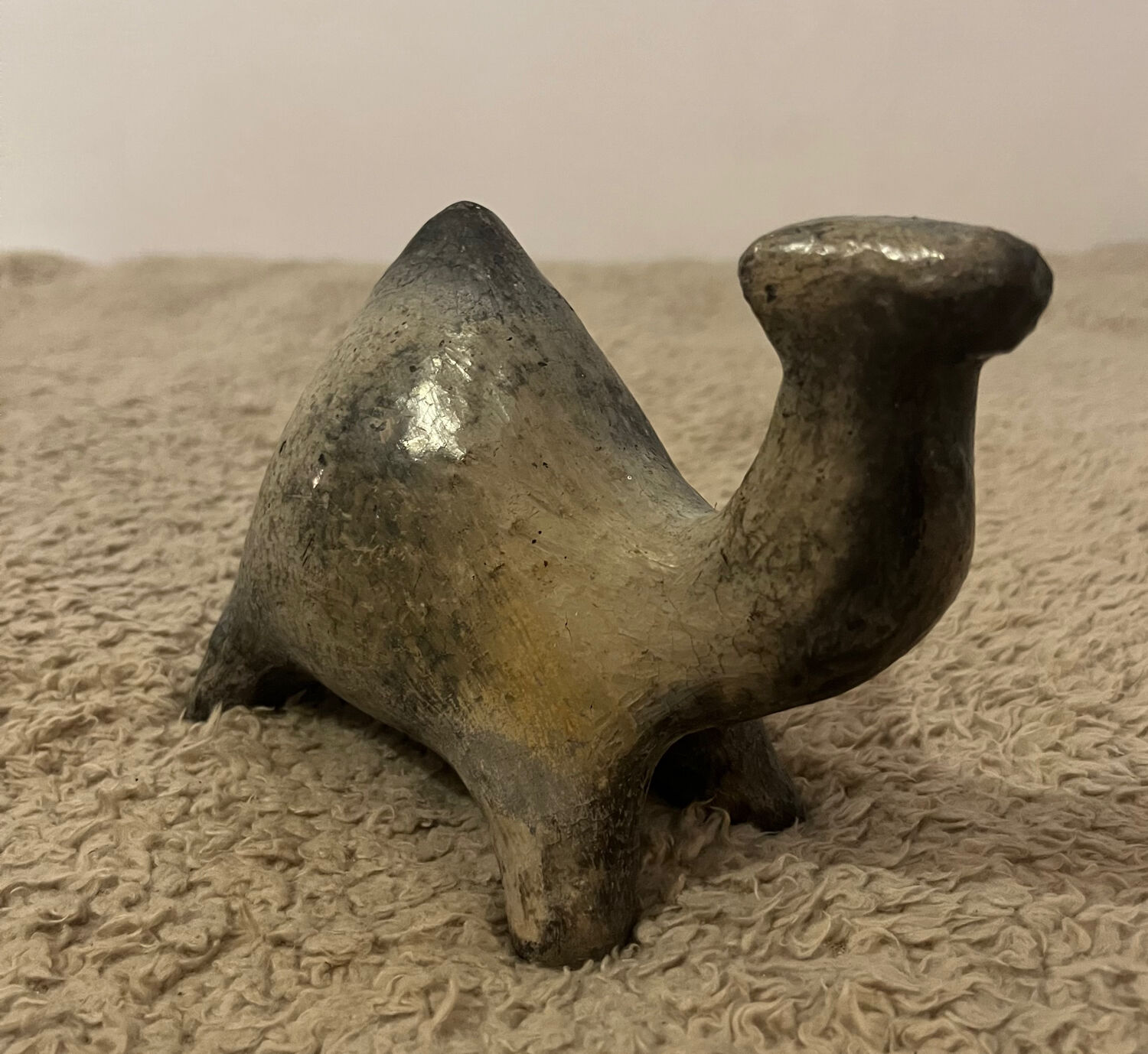 Ceramic camel statuette