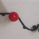 Vintage wall coat rack "Atomic" in wrought iron with multicoloured balls.