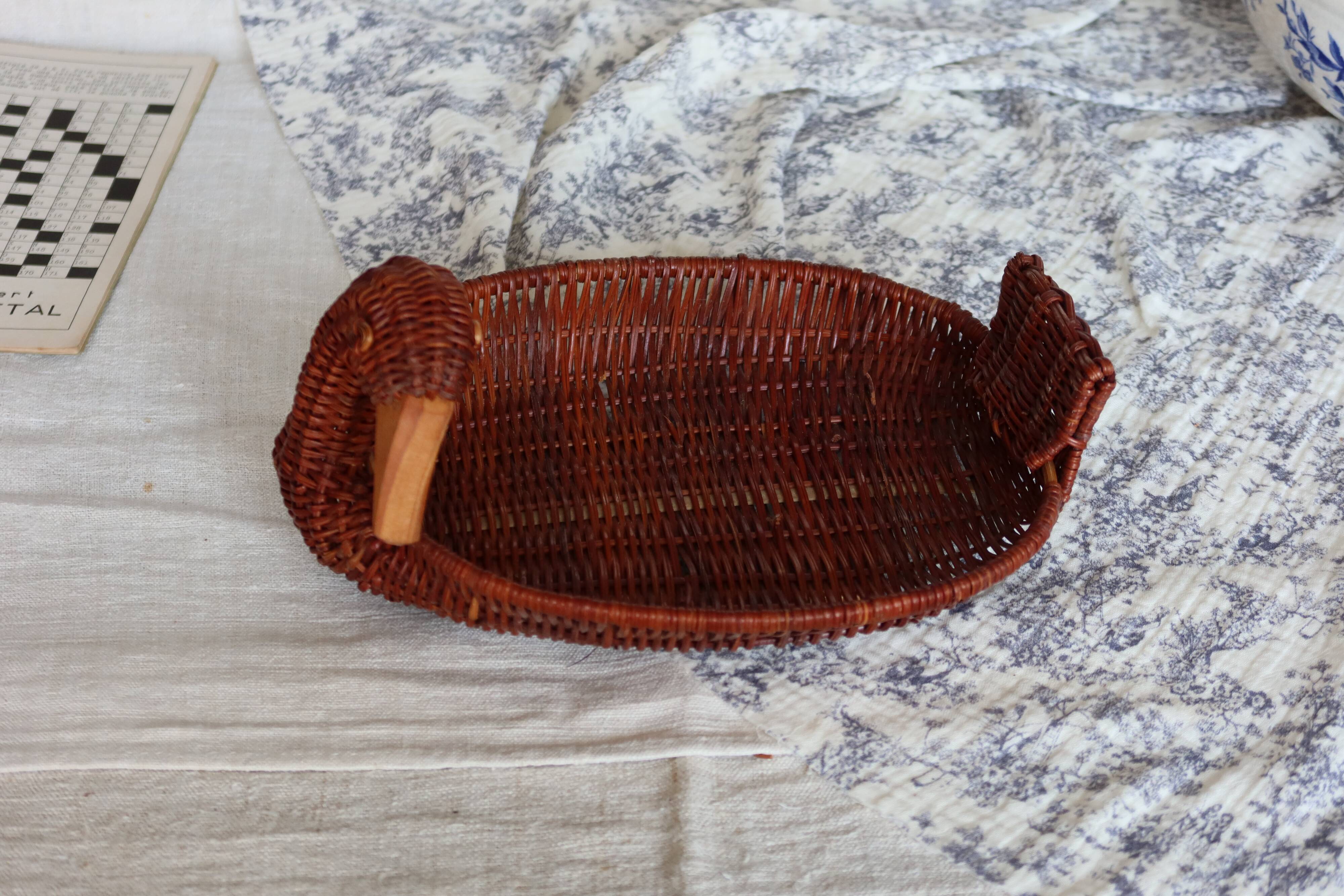 Vintage dark wicker duck basket