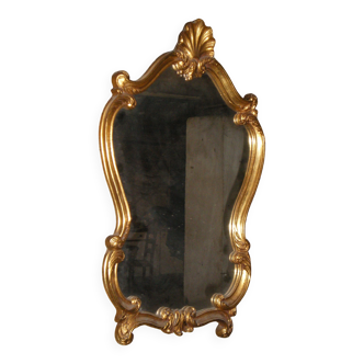 Grand miroir doré style Louis XV à coquille.