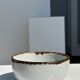 Small white glazed ceramic bowl black edges