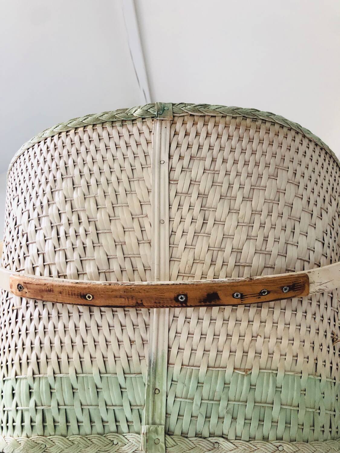 Wood and wicker cradle from the 1950s.