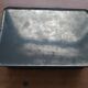 Vintage black art deco metal box with fish decoration