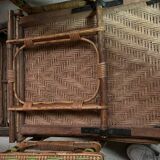 Old long chair rattan wicker garden armchair
