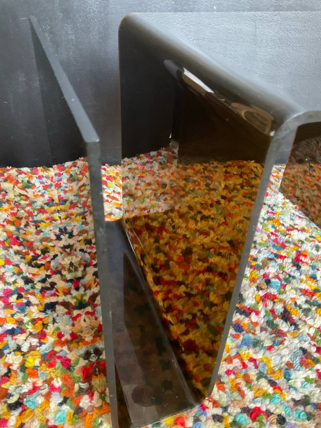 Smoked plexiglass magazine rack side table from the 70s