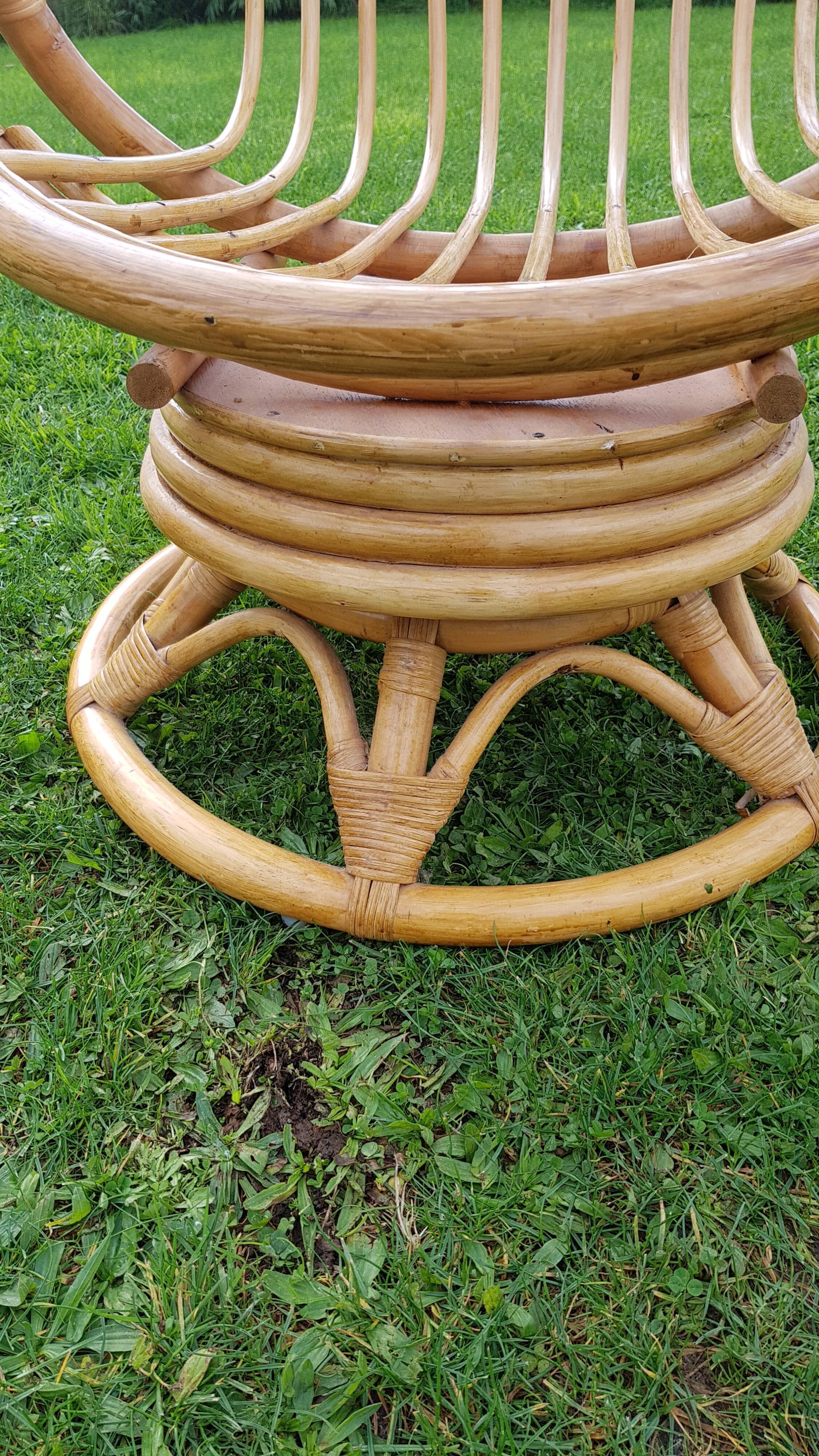 Pair of swivel rattan armchairs
