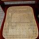 Folding wooden chairs and cannage