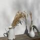 Old white enamelled metal pitcher