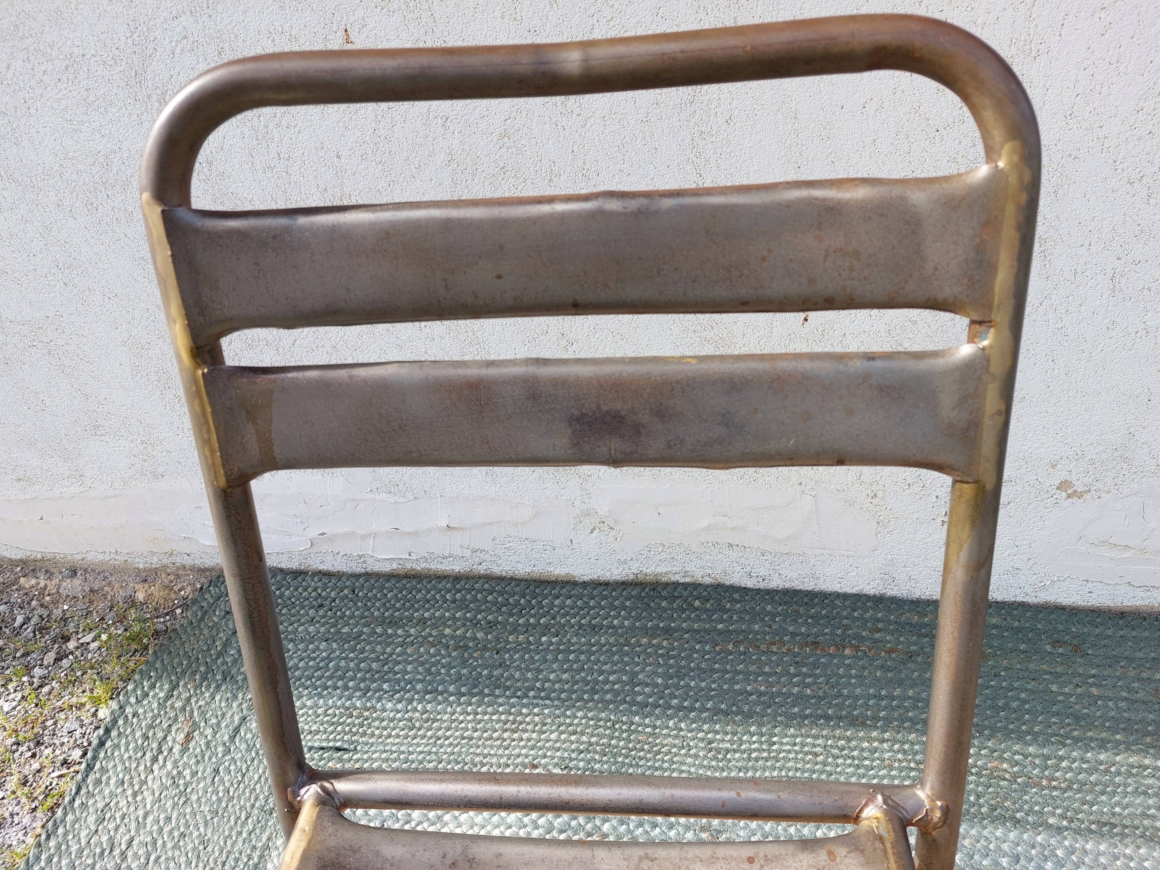 3 metal chairs, Tolix style