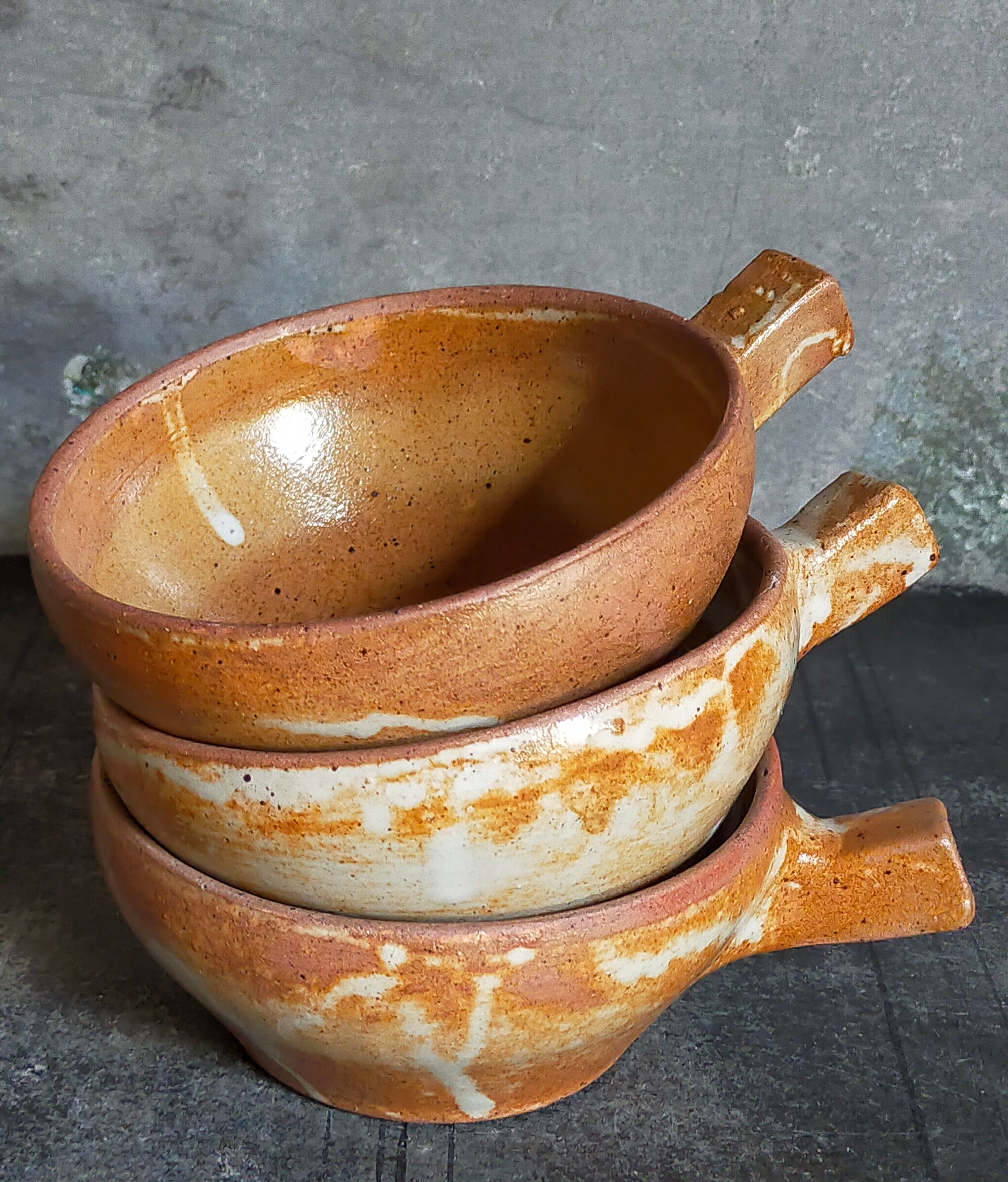 Three vintage marais sandstone bowls