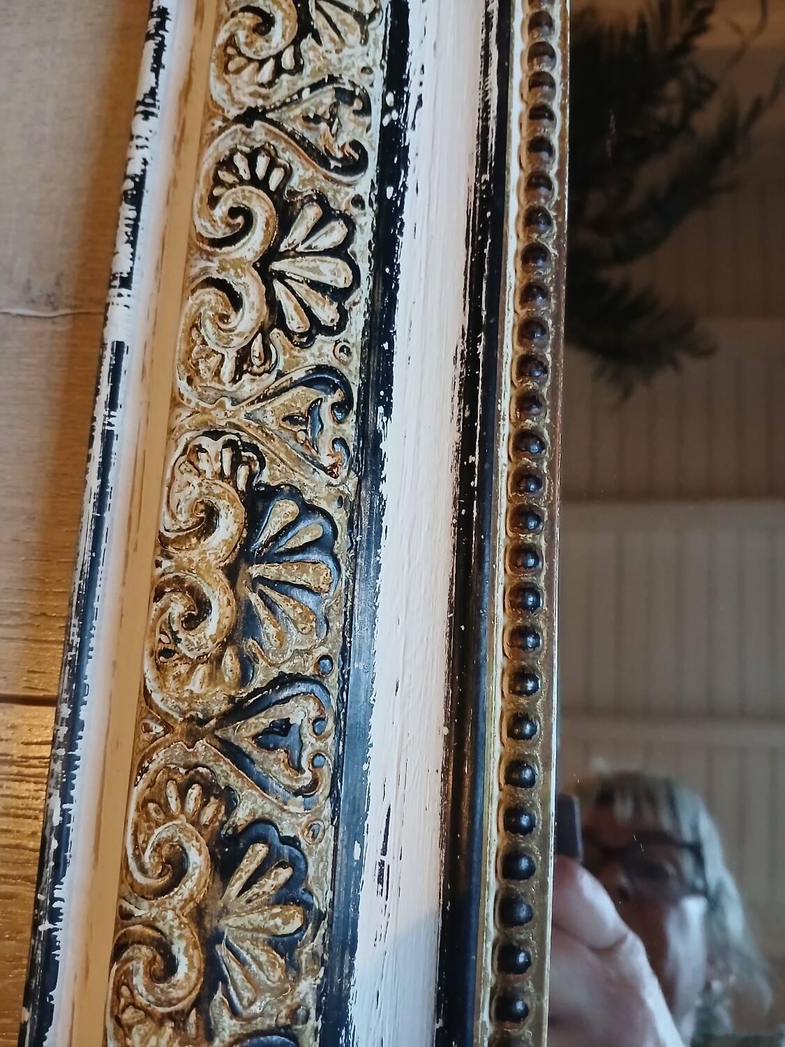 Antique mirror with carved wooden frame