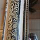 Antique mirror with carved wooden frame