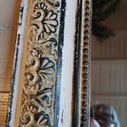 Miroir ancien avec cadre en bois sculpté 