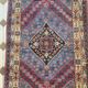 Tapis d'Orient persan ancien en laine à médaillon central