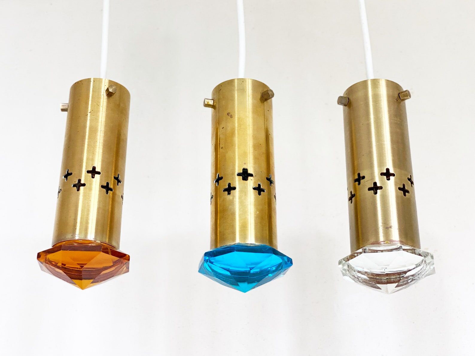 3 Mid Century Helmer Andersson for Örsjö hanging lamps, Brass and colored glass