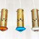 3 Mid Century Helmer Andersson for Örsjö hanging lamps, Brass and colored glass