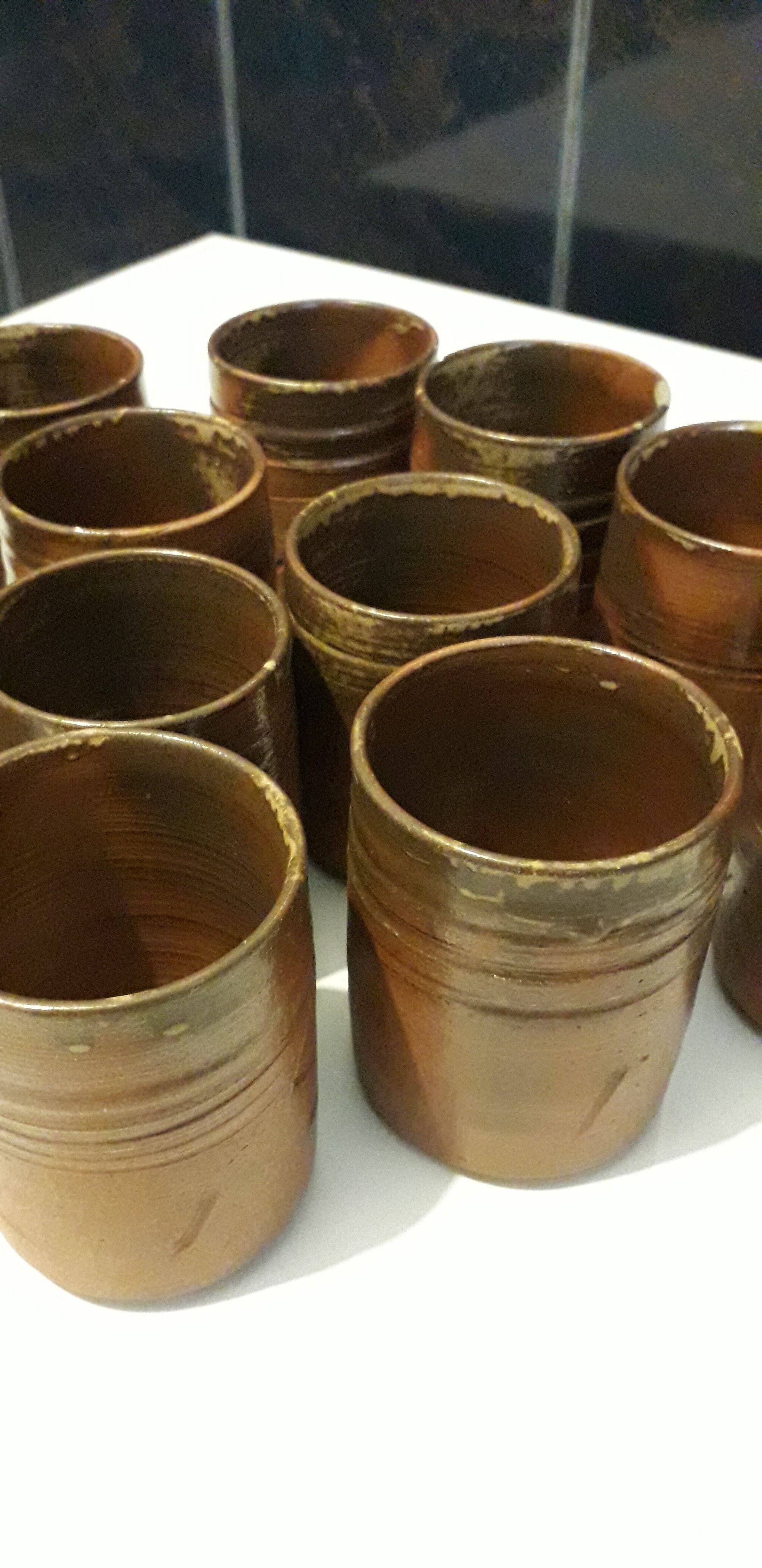 Set of 10 Japanese tea glasses in partially enamelled sandstone