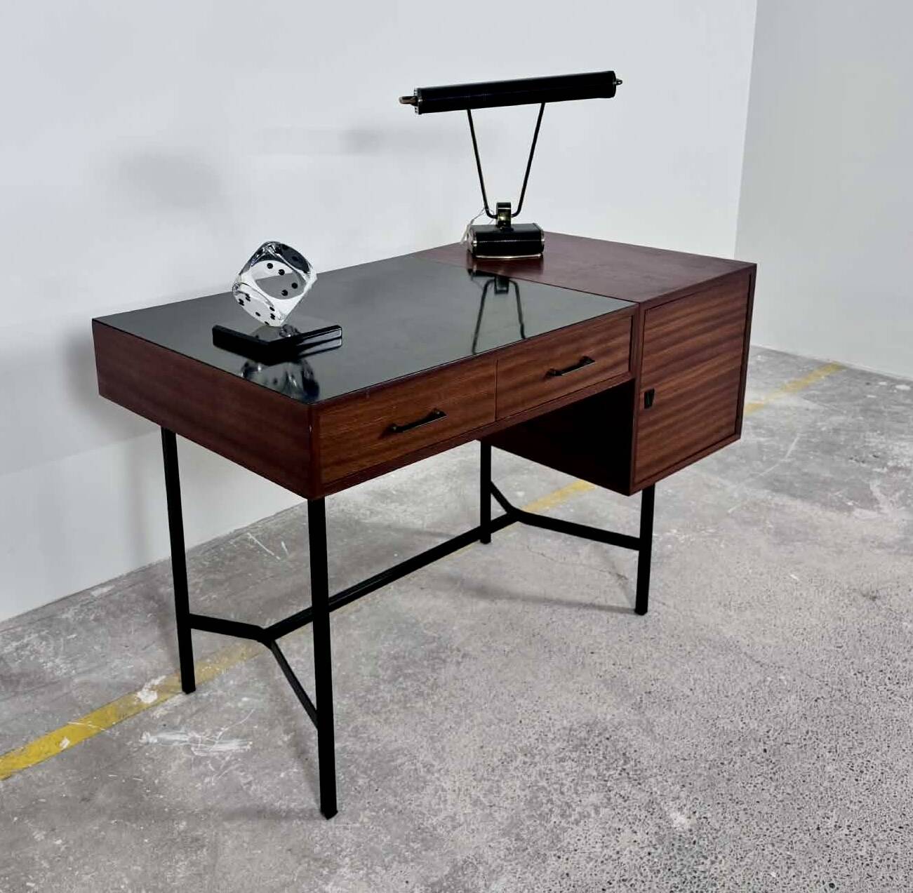 French modernist desk from the 1950s with 2 drawers, 1 cabinet, and 1 container.