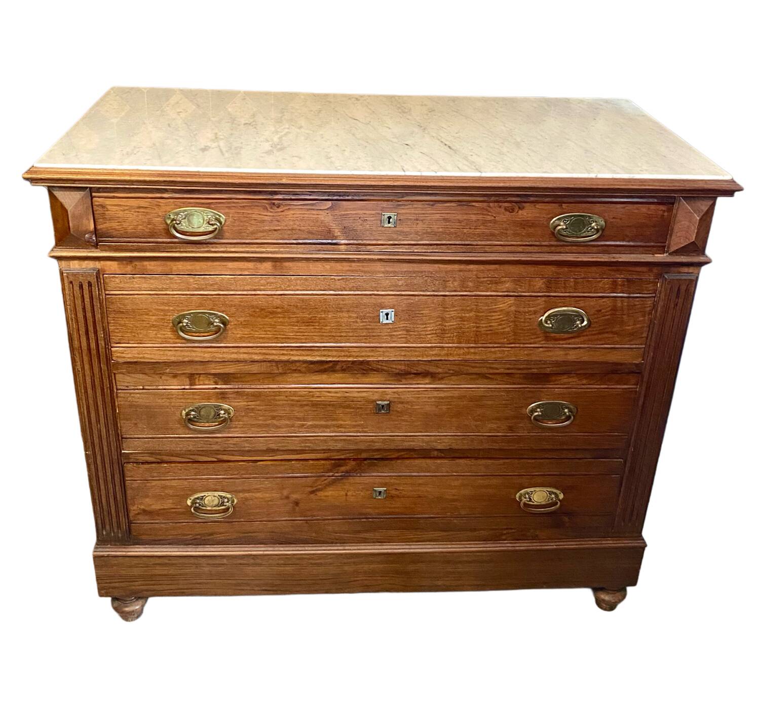 Louis Philippe antique chest of drawers with 4 drawers and a white marble top.