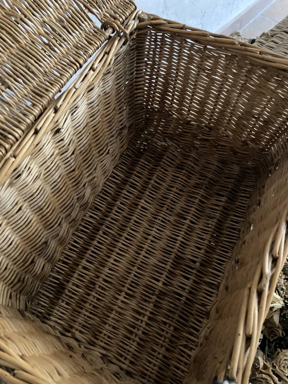 Antique wicker basket with closure and handle