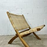 Wicker folding armchair