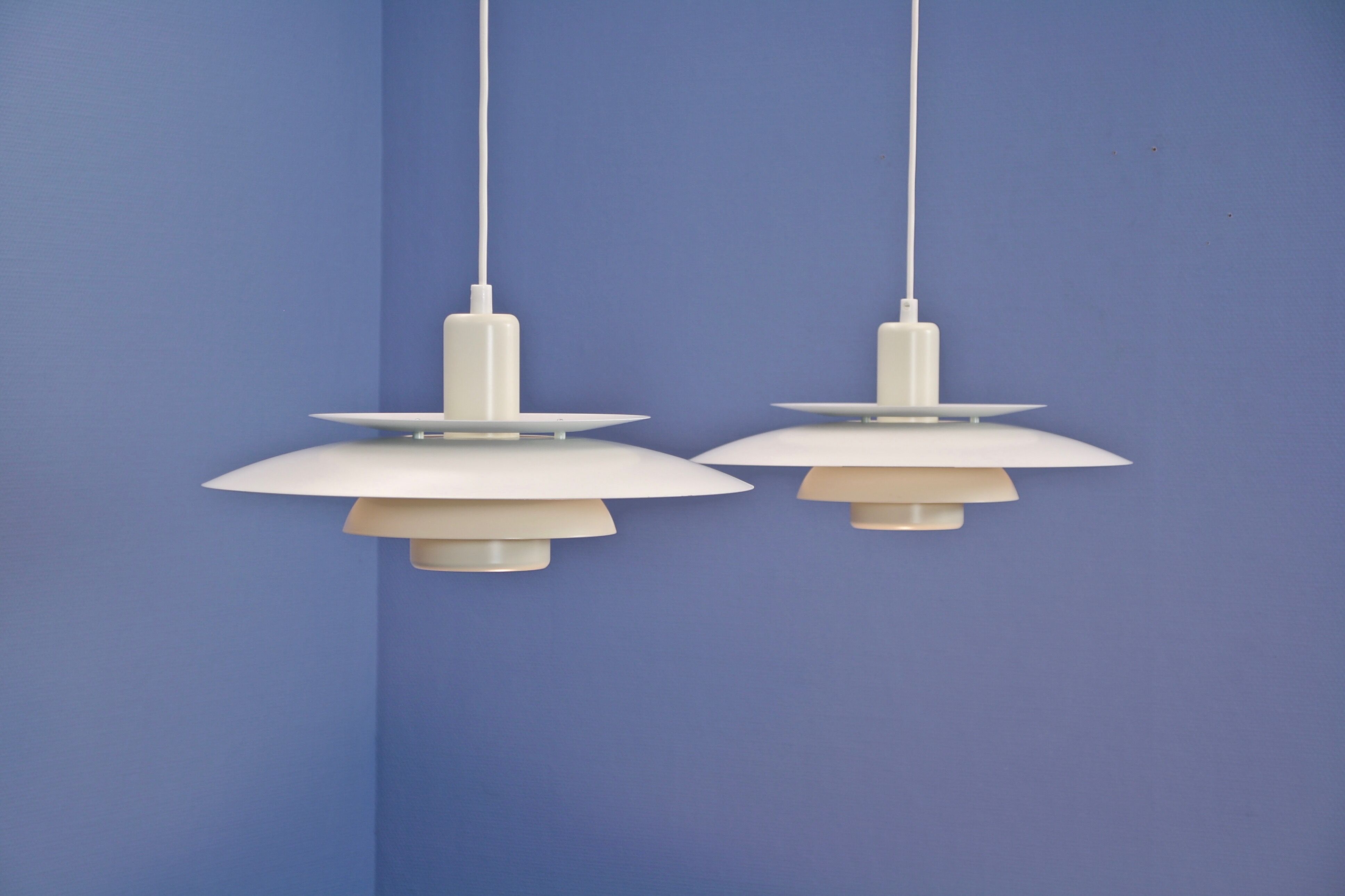 Set of 2 danish hanging lamps in white and off white by Lyskaer, 1970s