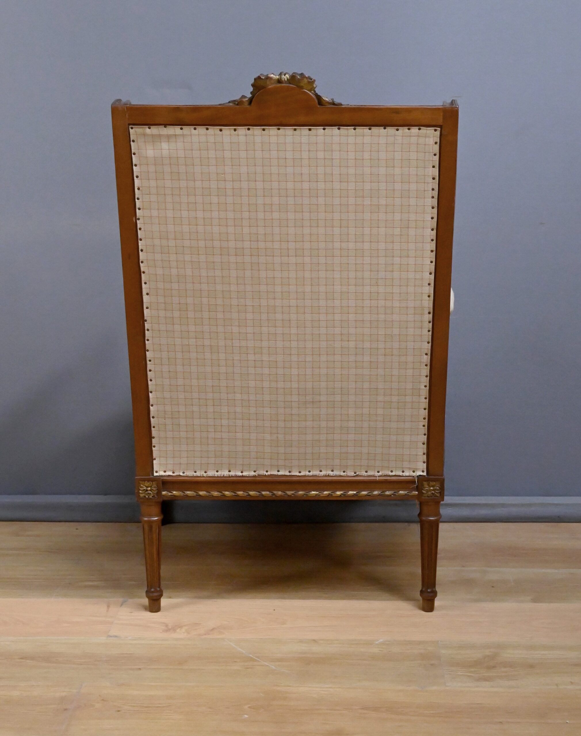 Wingback armchair in walnut, Louis XVI style – late 19th century