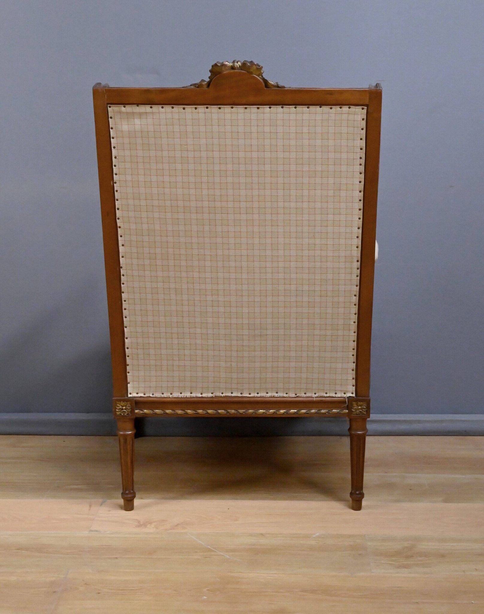 Wingback armchair in walnut, Louis XVI style – late 19th century
