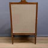Wingback armchair in walnut, Louis XVI style – late 19th century