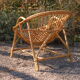Fauteuil rotin coquille années 60