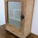 Small glass wall cabinet from the 1960s.