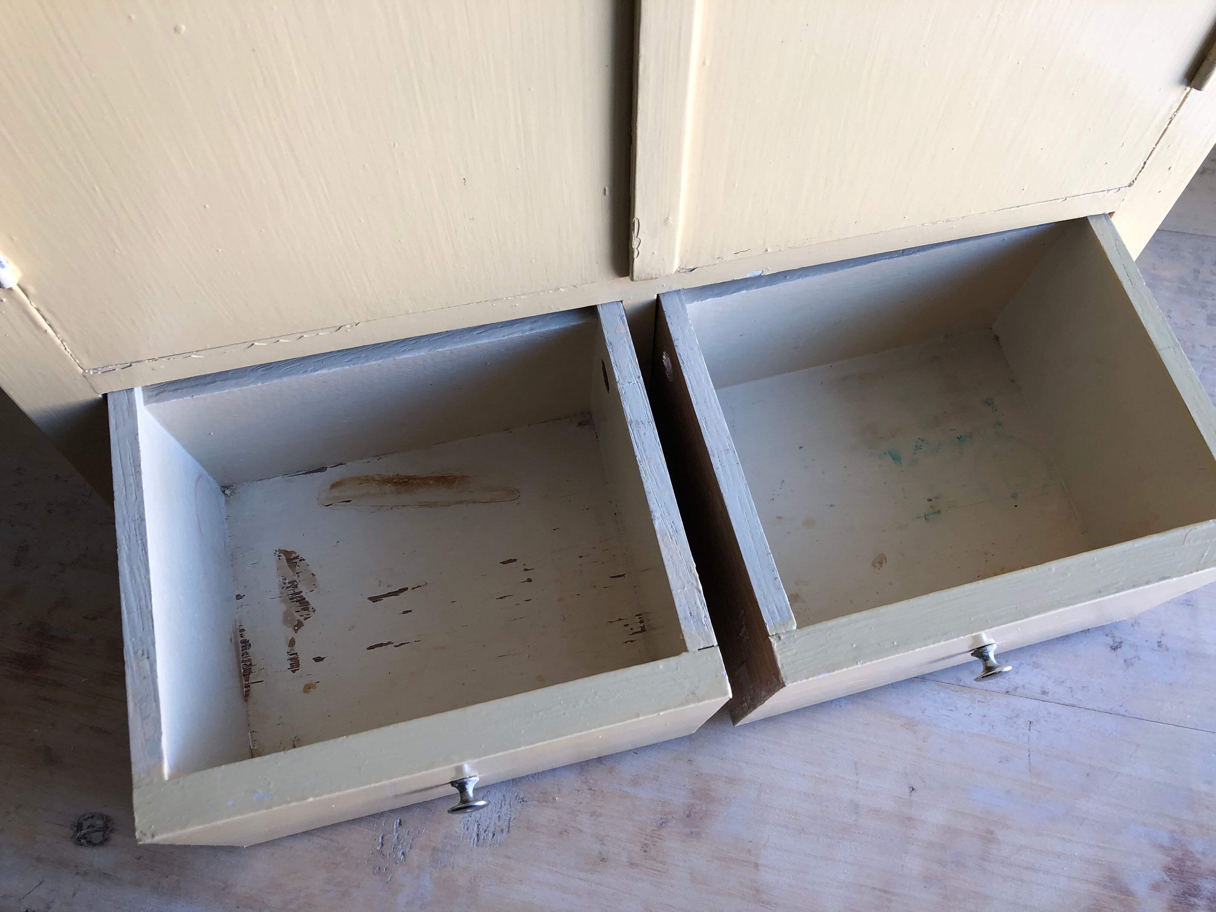 Weathered toilet cabinet