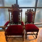 Pair of Louis XIII style armchairs in carved wood